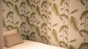 2 dormitorios, tabla de planchar con plancha, cuna de viaje y wifi