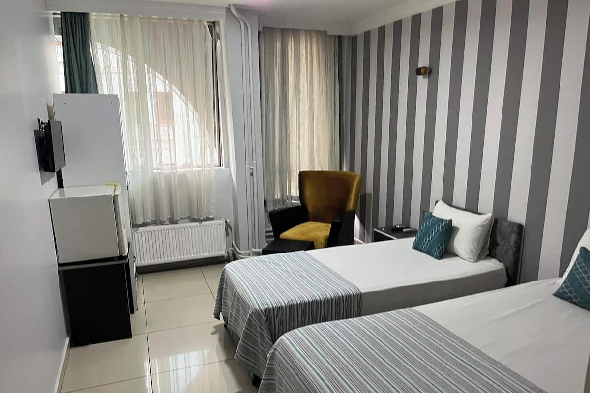 Classic Triple Room, City View | Premium bedding, free WiFi, bed sheets