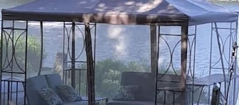 Adirondack Hideout, lakefront location and sandy shoreline