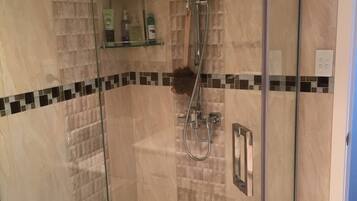 Shower, hair dryer, towels, soap