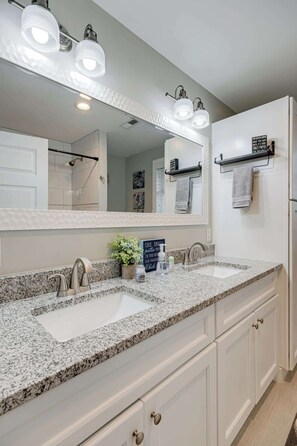 Bathtub, hair dryer, towels