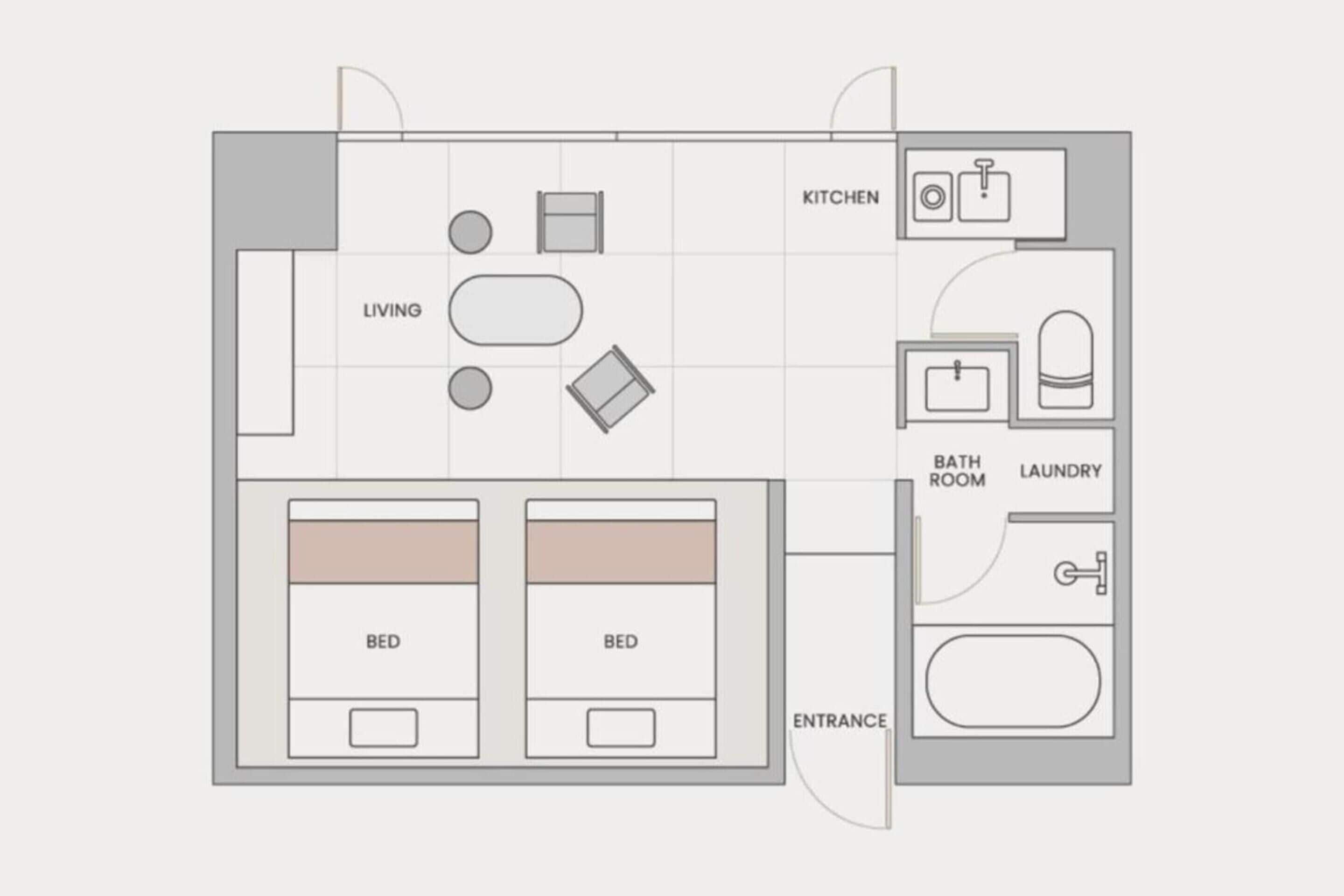 A floor plan of a hotel room with two beds, a living area, kitchen, bathroom, and laundry facilities.