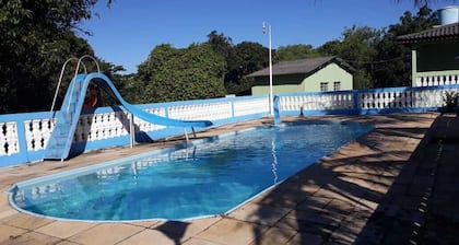Farm with swimming pool, kiosk, barbecue, soccer field, play ground.