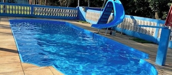 Farm with swimming pool, kiosk, barbecue, soccer field, play ground.