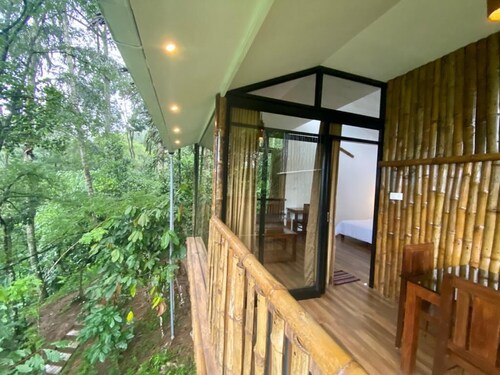 IlliVilla Bamboo claded single room cottage inside Organic Spices Farm in Munnar