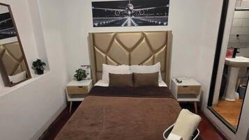 Premium bedding, down duvets, pillow-top beds, laptop workspace