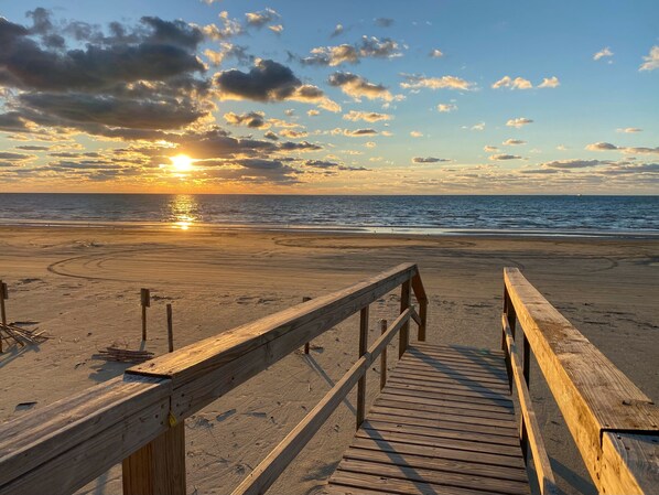 On the beach, sun-loungers, beach towels