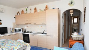 Apartment, 2 Bedrooms | Private kitchen - Apartment With Pool Ideal for Families (Castelsardo)