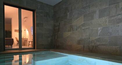 Apartment with heated pool and garden.