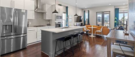 Fridge, coffee/tea maker, cookware/dishes/utensils