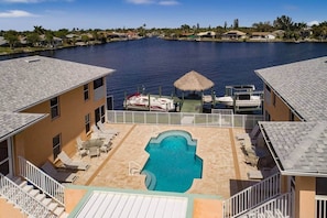 Outdoor pool, a heated pool - Casa Laura Unit D - Lake Louise with a private pool (Cape Coral)