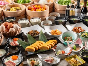 A variety of dishes and condiments arranged on a table, including eggs, meat, and vegetables. - KAMENOI HOTEL NIKKO YUNISHIGAWA ALL-INCLUSIVE RESORT (Nikko)