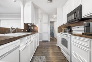 Fridge, microwave, oven, stovetop - Unit D Water Front Condo, Under a Mile to beach! (Corpus Christi)