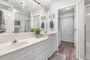 Combined shower/tub, hair dryer, towels, soap