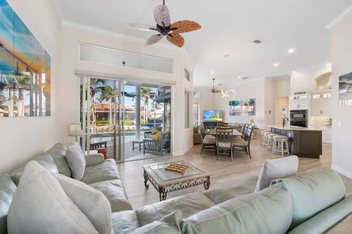 Near Beach & Dining/Shops ~Waterfront; 2 King Suites, Saltwater Pool, Dock, WiFi, Bikes & More
