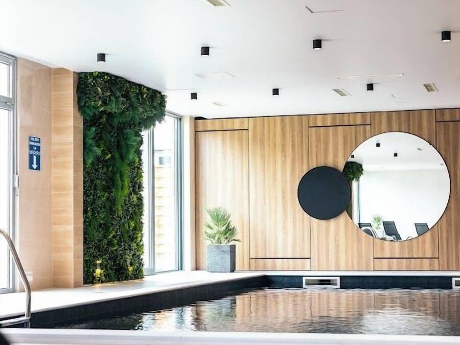 Indoor pool, open 9:00 AM to 10:00 PM, pool umbrellas