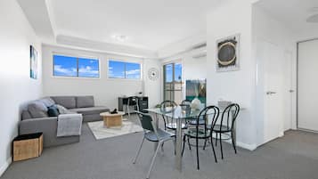 Apartment, 2 Bedrooms | Living area | Flat-screen TV