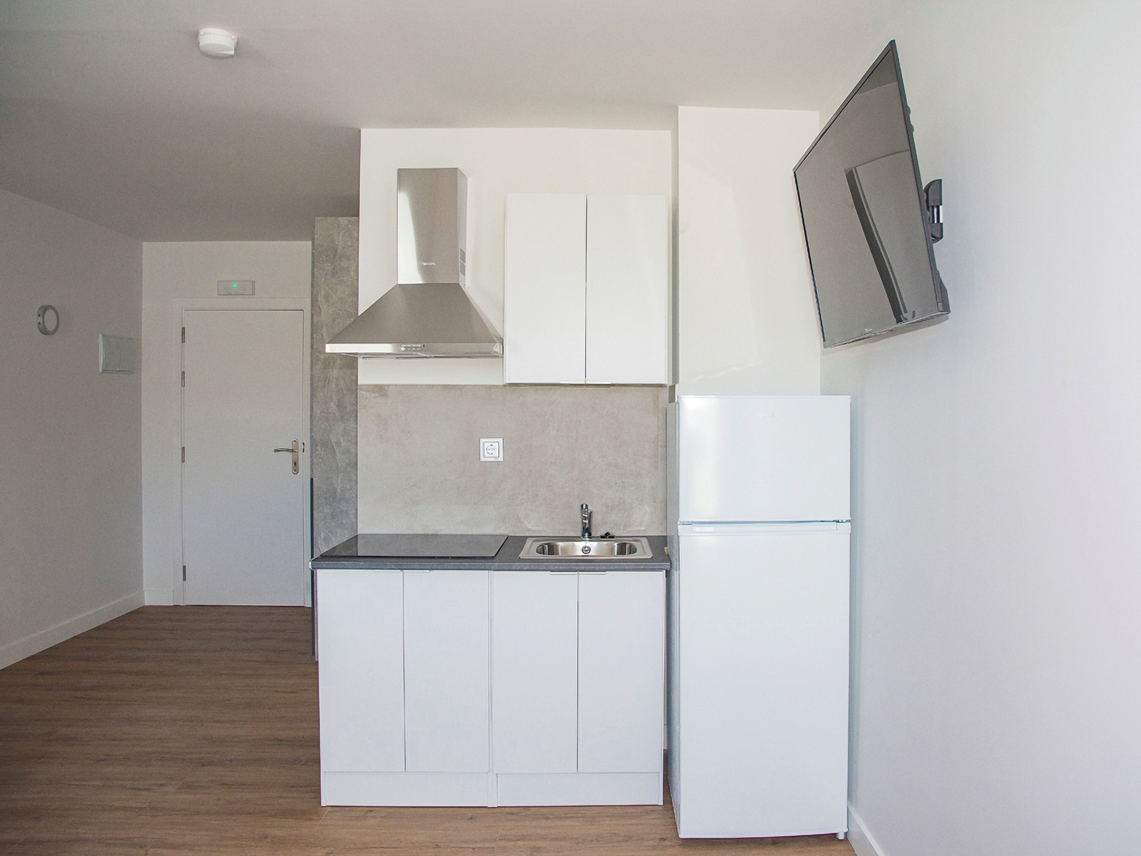 Mini-fridge, microwave, stovetop, cookware/dishes/utensils