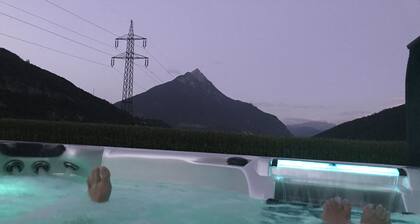 Comfort apartment with outdoor whirlpool and barrel sauna