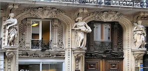 An ornate building facade with intricate carvings and statues.