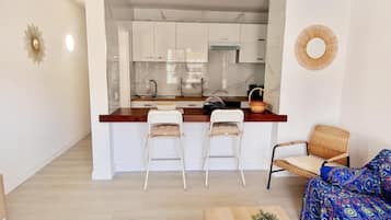 Fridge, microwave, coffee/tea maker, toaster