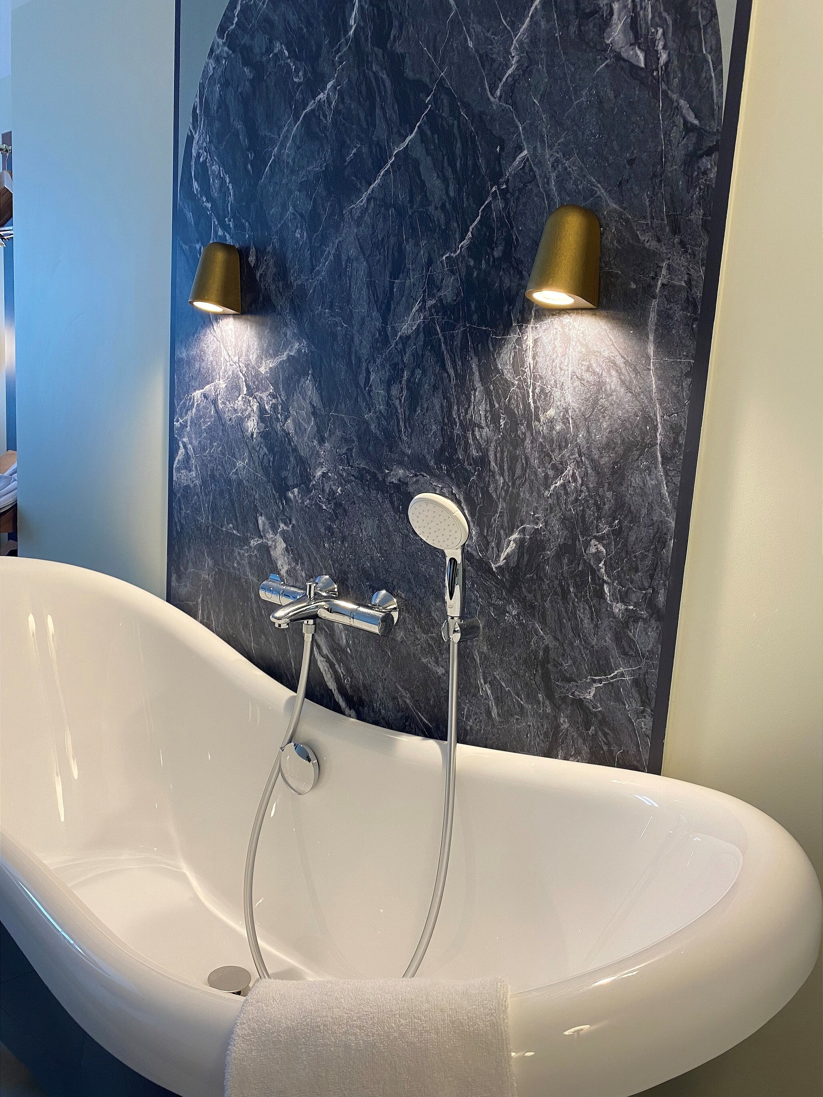 privilege double room with bathtub | bathroom | hair dryer, slippers, towels, soap