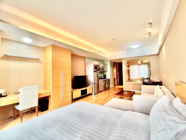 Executive appartement, 1 queensize bed, uitzicht op tuin | Luxe beddengoed, donsdekens, een kluis op de kamer