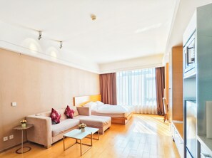 Executive appartement, 1 queensize bed, uitzicht op tuin | Luxe beddengoed, donsdekens, een kluis op de kamer