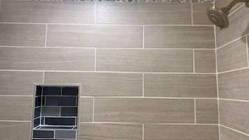 Combined shower/tub, hair dryer, towels, soap