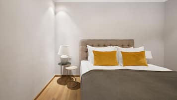 Premium bedding, in-room safe, laptop workspace, soundproofing