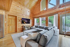 Cabin, Multiple Beds, Hot Tub | Living room | 40-inch TV with cable channels, fireplace