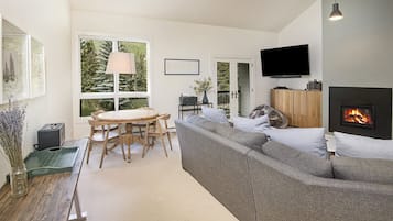 Apartment (Coldstream Townhome 7) | Living room | Flat-screen TV, fireplace