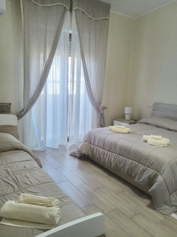 2 dormitorios, tabla de planchar con plancha, wifi y ropa de cama