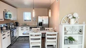 Coffee/tea maker, fridge, microwave, oven
