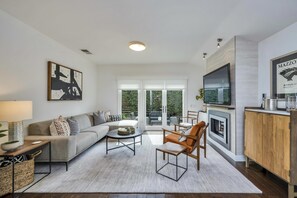 Smart TV, fireplace, books