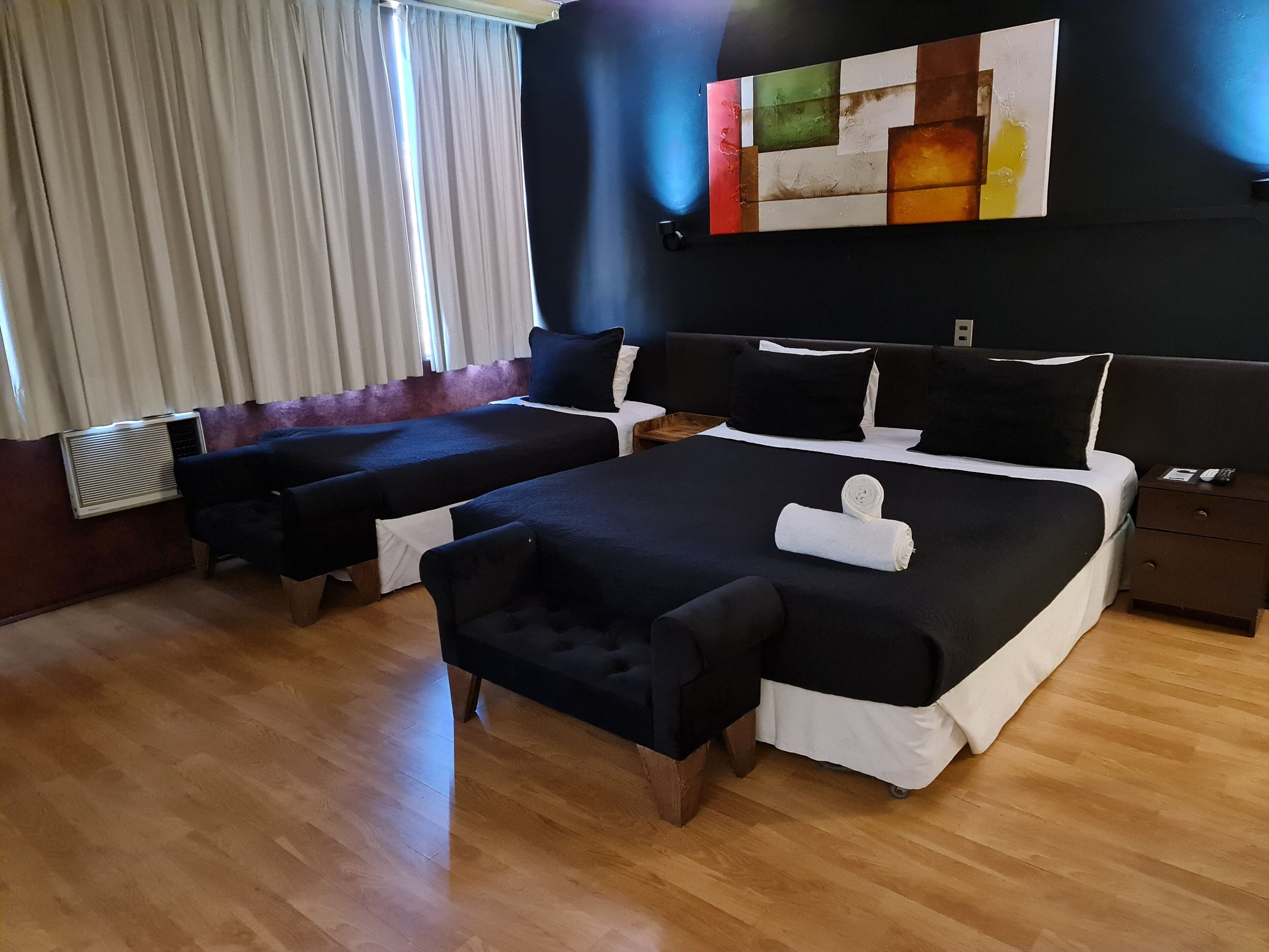 Habitación triple básica | Caja de seguridad en la habitación, wifi gratis y ropa de cama 