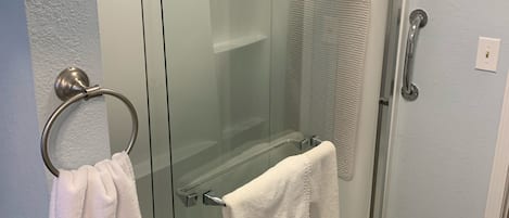 Shower, towels, toilet paper