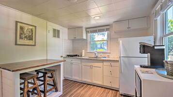 Fridge, microwave, cookware/dishes/utensils