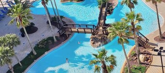 Gulf View! 2bd/2ba. Walk to Beach. Pools open until 11:00pm!