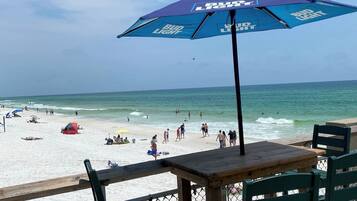 On the beach, sun loungers, beach towels