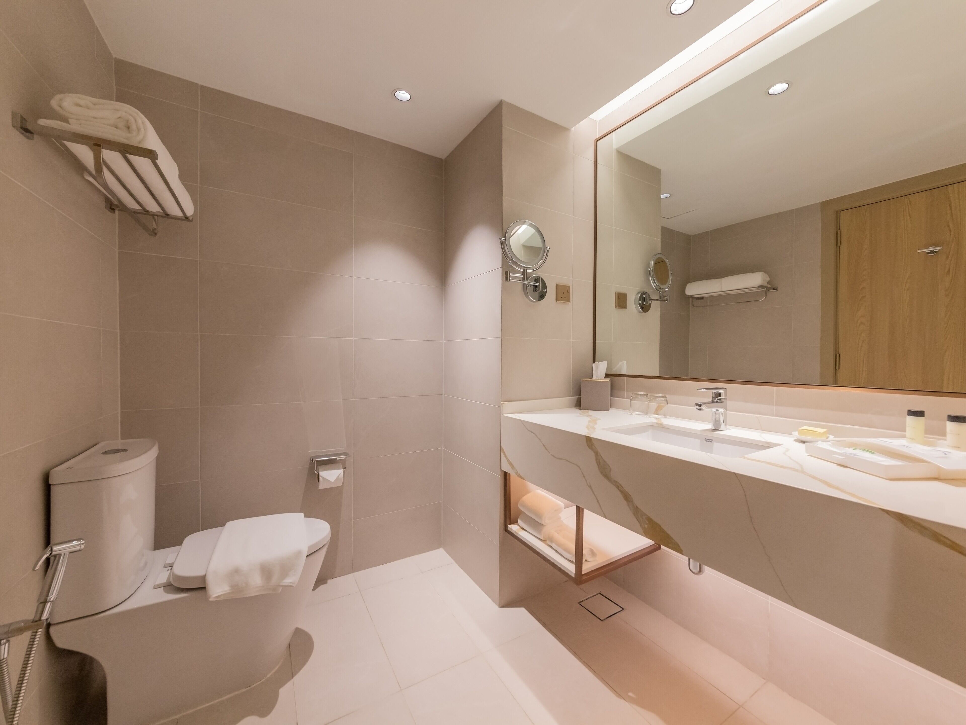 rainfall showerhead, hair dryer, bathrobes, slippers