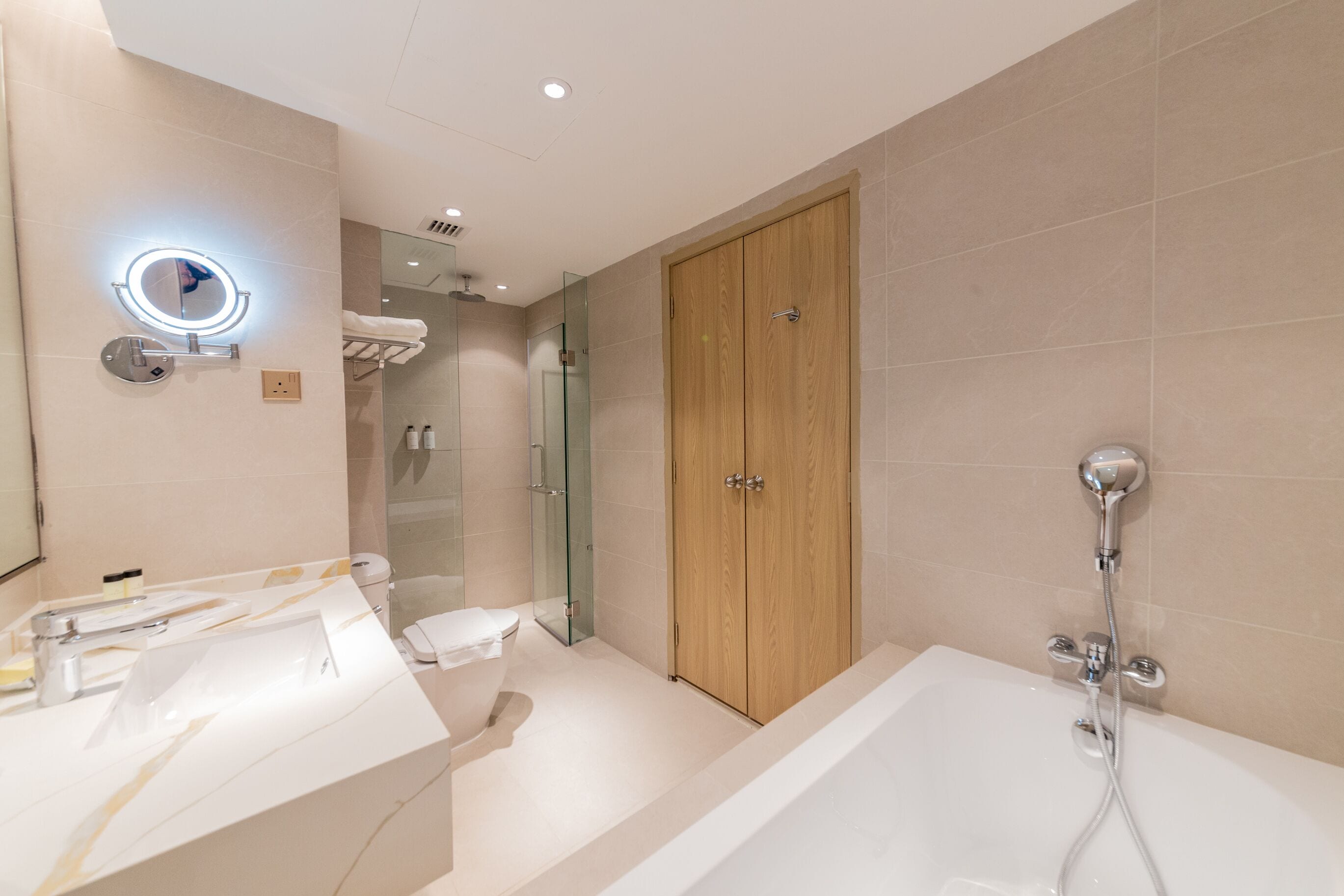 rainfall showerhead, hair dryer, bathrobes, slippers