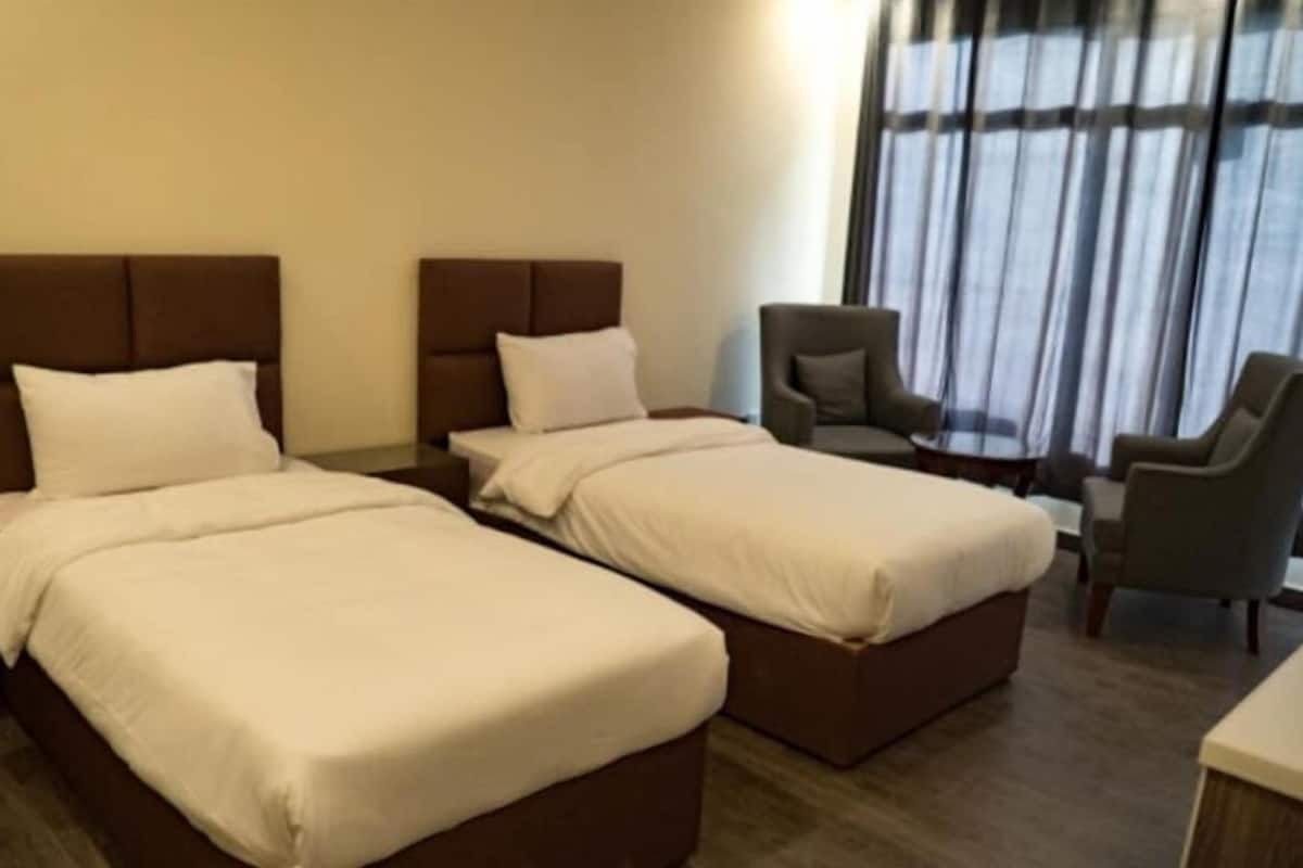 Chambre Exécutive avec lits jumeaux