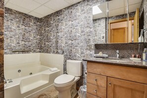 Tina con regadera y tina de hidromasaje