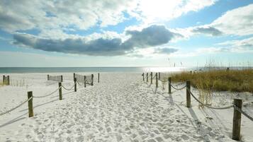 On the beach, sun loungers, beach towels