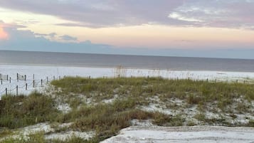 On the beach, sun loungers, beach towels