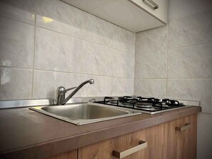 Fridge, stovetop, toaster, freezer