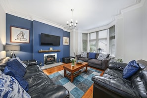 Smart TV, fireplace, DVD player, foosball