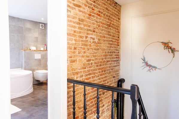 Shower, rainfall showerhead, towels