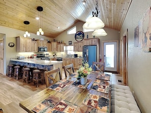 Enjoy casual dining at the central island with bar stools.